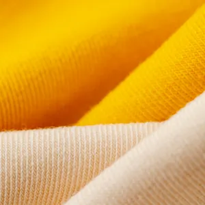 Premium combed long-staple cotton crew socks in bright yellow and cream white