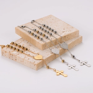 Elegant stainless steel rosary bracelets with heart charm, cross tassel and metal beads