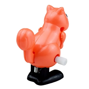Orange clockwork jumping squirrel toy, wind-up mechanical animal model for kids