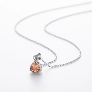 Minimalist S925 sterling silver necklace with a triangular orange gemstone pendant