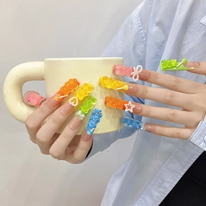 Handmade rainbow press-on nails with 3D gummy bears and pearls in long coffin shape