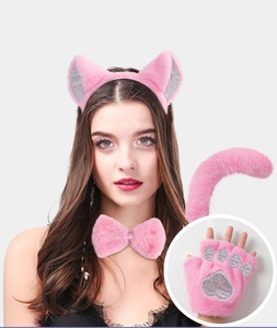 Detailed close-up of pink cat cosplay gloves with silver sequin paw pad design