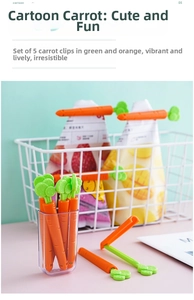 Five carrot-shaped food sealing clips in a storage box used on snack bags