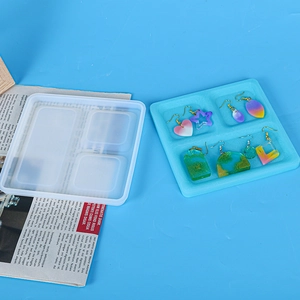 Detailed view of DIY resin silicone mold featuring various earring shapes and colorful results