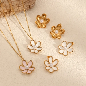 Elegant gold-tone flower necklaces and stud earrings set with enamel and pearls