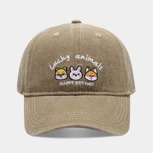 Close-up of khaki washed cotton baseball cap featuring detailed cute animal embroidery