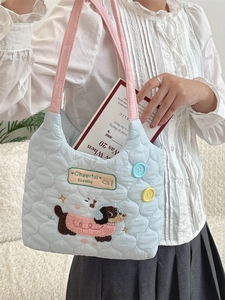 Quilted light blue tote bag with puppy embroidery and pink straps for students