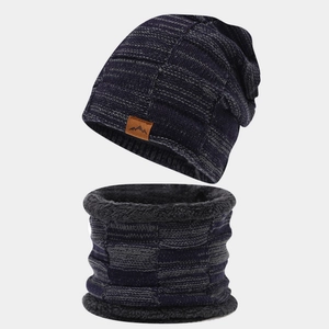 Close-up of knit beanie and neck warmer set with warm grey fleece lining texture