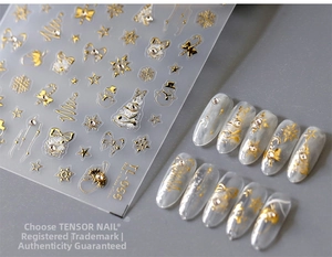 Detail of TL-066 gold Christmas nail stickers with snowflakes and trees on nails