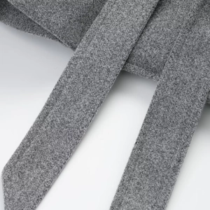 Gray wool-like short jacket with stand collar and double-breasted buttons in minimalist style