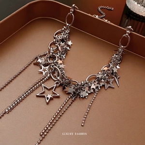 Sparkling star tassel multilayer necklace with rhinestone pendants in silver finish