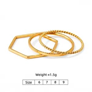 Three-piece minimalist gold stainless steel stacking rings in geometric and textured styles