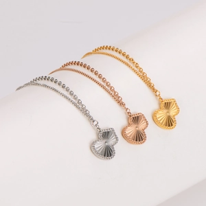Flat gourd pendant necklaces in silver, rose gold and gold finishes with bead edge trim
