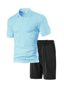 Close-up of light blue waffle texture polo shirt and black mesh sports shorts set