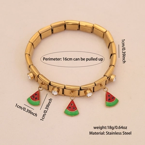 Gold stainless steel stretch bracelet with watermelon charms and sparkling cubic zirconia
