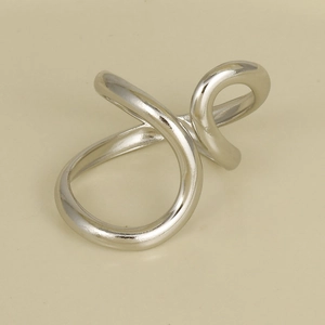 Close-up of geometric minimalist 304 stainless steel silver open ring on beige surface