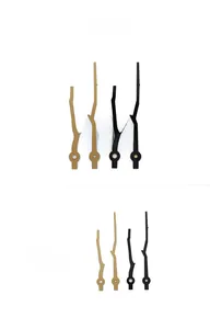Detailed view of branch-shaped clock hands in gold and black finishes, model 971
