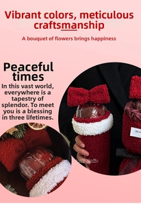 Detail of red plush Christmas apple gift wrap with large bow and white lamb wool trim