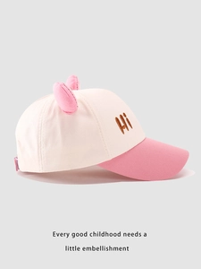 Close-up of pink and beige baseball cap with cute ears and Hi embroidery detail