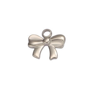Detailed close-up of a silver stainless steel bow pendant for DIY jewelry making