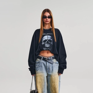 Oversized black cotton long sleeve T-shirt with giant skull graphic and crew neck
