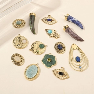 Bohemian gold stainless steel pendants set with natural stones in horn and eye shapes