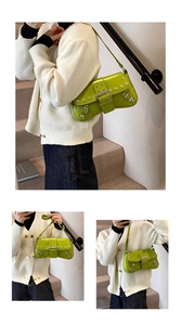 Detail of green PU leather underarm bag with silver rivets and Y2K buckle accents