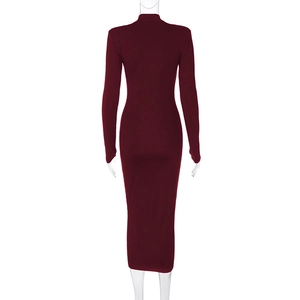 Detailed back view of a slim fit burgundy long-sleeve dress with elegant wrap tailoring
