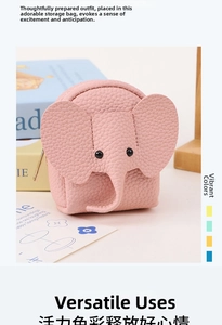 Detailed close-up of pink leather elephant coin purse with zip closure and 3D ear details