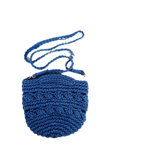 Royal blue hand-woven cotton rope shoulder bag with hollow knit texture and braided strap