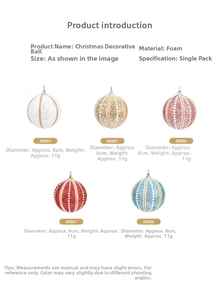 Detailed close-up of 8cm glitter foam Christmas balls in white gold pink red and blue