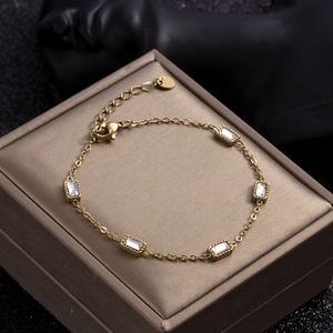Gold-plated stainless steel chain bracelet featuring five rectangular white zircon stones
