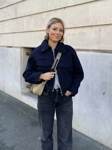 Women's dark blue cropped wool jacket with zipper and large pockets for autumn street style