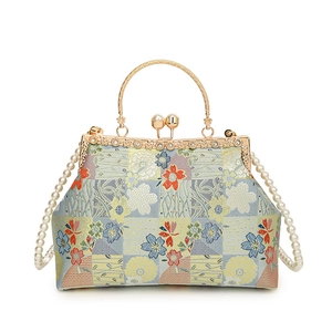 Light blue floral embroidery evening bag with golden metal ring handle and pearl chain