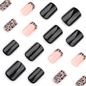 Short square leopard print press on nails set with black French tips on white background