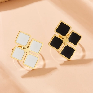 Gold-plated stainless steel rings with black and white square enamel geometric designs