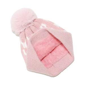 Detailed view of pink knitted beanie featuring thick thermal fleece lining and faux fur pom
