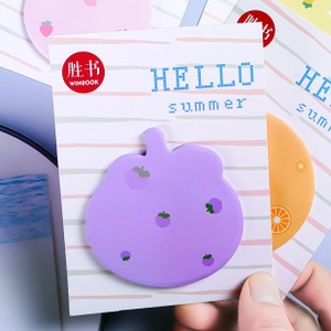 Close-up of cute purple fruit-shaped sticky notes on Hello Summer card packaging