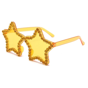 Star-shaped yellow rimless sunglasses with sparkling crystals for parties