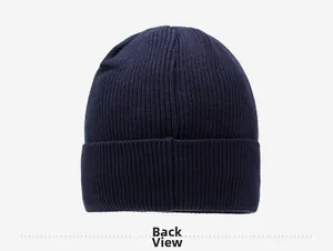 Detailed back view of a dark blue ribbed knit beanie with thick thermal material