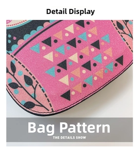 Detail of pink glitter fabric with colorful geometric owl patterns and neat black stitching