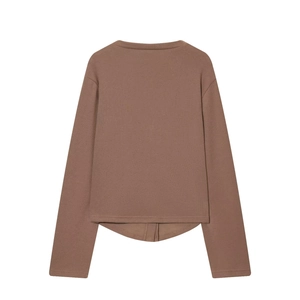 Close-up of dark brown slim-fit ribbed knit long-sleeve top with fine texture detail
