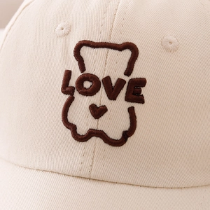 Kids cream baseball cap with brown bear LOVE embroidery made of premium cotton twill