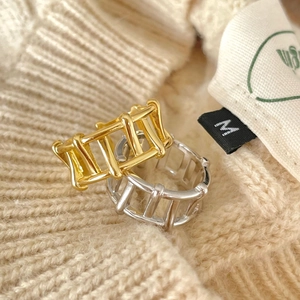 Minimalist 925 sterling silver open rings in gold and silver finish on knit fabric