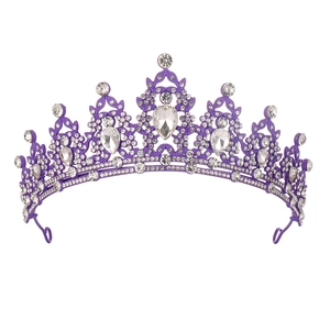 Detailed view of a purple bridal tiara with sparkling crystal rhinestones and pear-cut gems