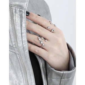 Minimalist S925 sterling silver ring with abstract irregular hollowed-out liquid design