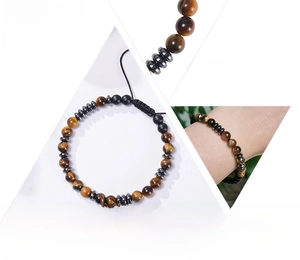 Detail view of Morse code tiger eye stone bracelet with adjustable cord and beads