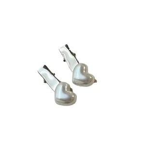 Minimalist silver alloy heart-shaped pearl hair clips for women with a glossy finish