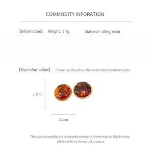 Detailed size and material information for brown resin and alloy round earrings