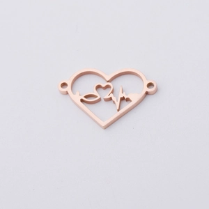 Macro shot of rose gold heart charm with hollow heartbeat pulse and dual connection rings